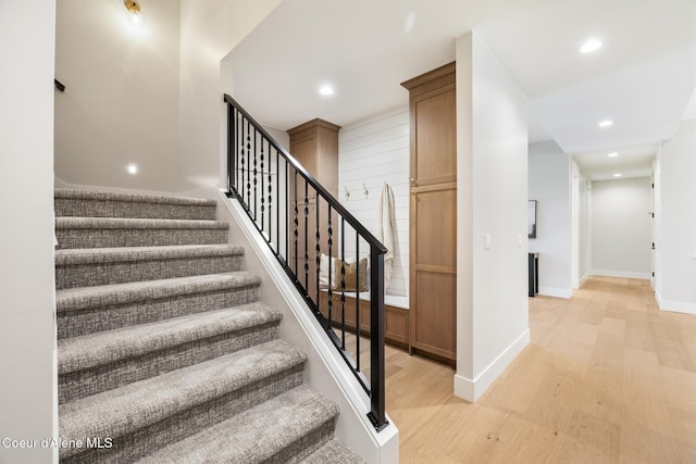 11551 N Bluejay Loop, Hayden, ID 83835 - stairs featuring wood finished floors and recessed lighting