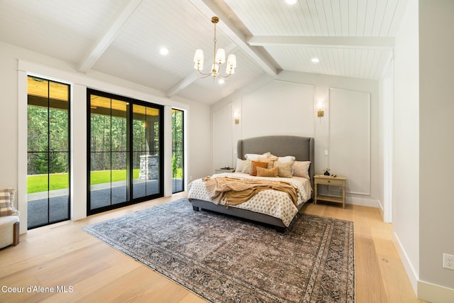 11551 N Bluejay Loop, Hayden, ID 83835 - bedroom featuring light wood-type flooring, access to outside, a chandelier, and recessed lighting