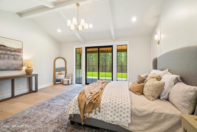 11551 N Bluejay Loop, Hayden, ID 83835 - bedroom featuring wood finished floors, access to outside, a chandelier, and recessed lighting