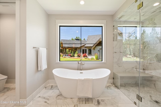 11551 N Bluejay Loop, Hayden, ID 83835 - full bath featuring marble finish flooring, a freestanding tub, recessed lighting, and a marble finish shower
