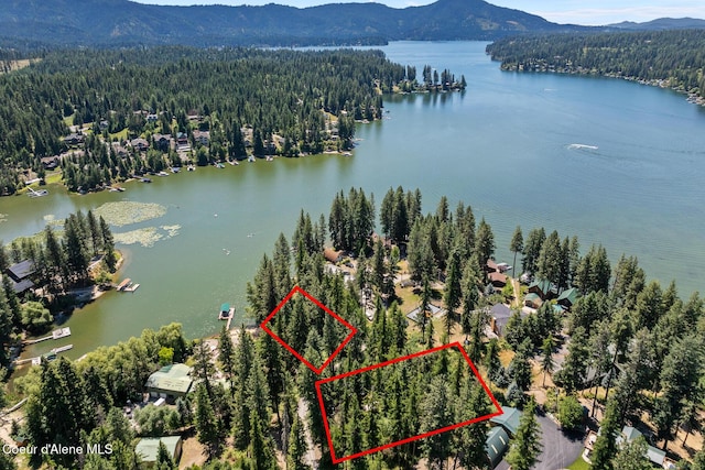 14545 N Samhill Trl, Hayden, ID 83835 - aerial overview of property's location with a water and mountain view and property boundaries highlighted