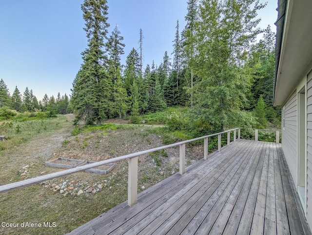 699 Granite Ridge Rd, Priest River, ID 83856 - wooden terrace with a forest view