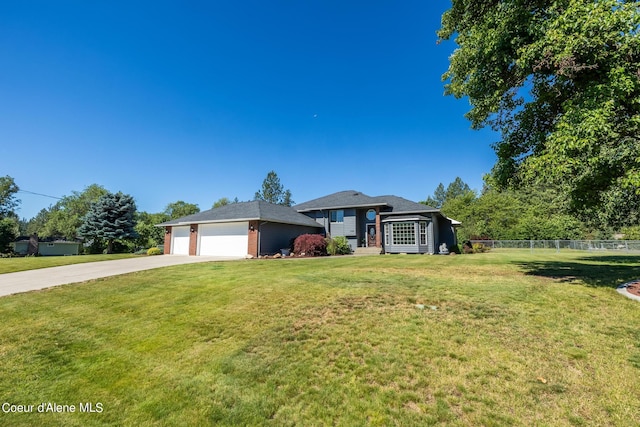 3206 N Lodgepole Rd, Coeur Dalene, ID 83815 - view of front of house with driveway and an attached garage