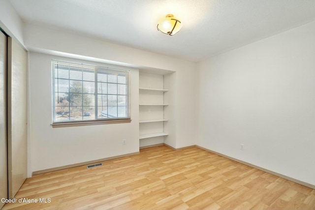 3206 N Lodgepole Rd, Coeur Dalene, ID 83815 - spare room featuring wood finished floors