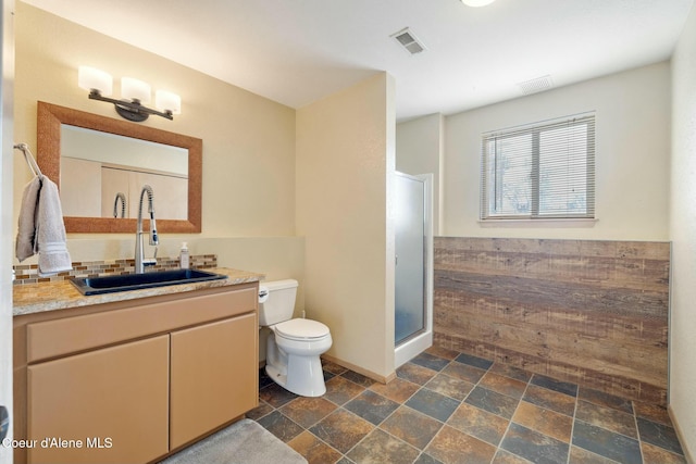 3206 N Lodgepole Rd, Coeur Dalene, ID 83815 - full bath with stone finish floors, vanity, and a shower stall