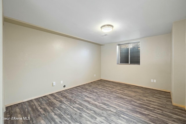 3206 N Lodgepole Rd, Coeur Dalene, ID 83815 - unfurnished room featuring wood finished floors
