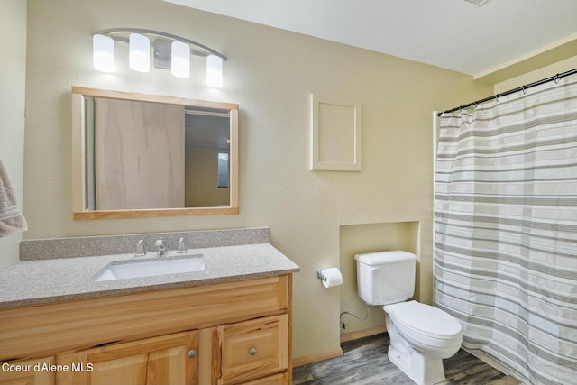 3206 N Lodgepole Rd, Coeur Dalene, ID 83815 - full bath featuring vanity, wood finished floors, and a shower with curtain