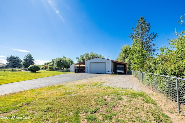 3206 N Lodgepole Rd, Coeur Dalene, ID 83815 - garage with driveway and a garage