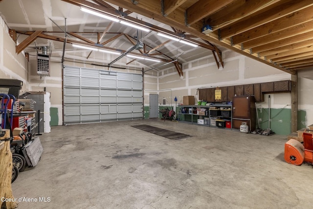 3206 N Lodgepole Rd, Coeur Dalene, ID 83815 - garage featuring a heating unit