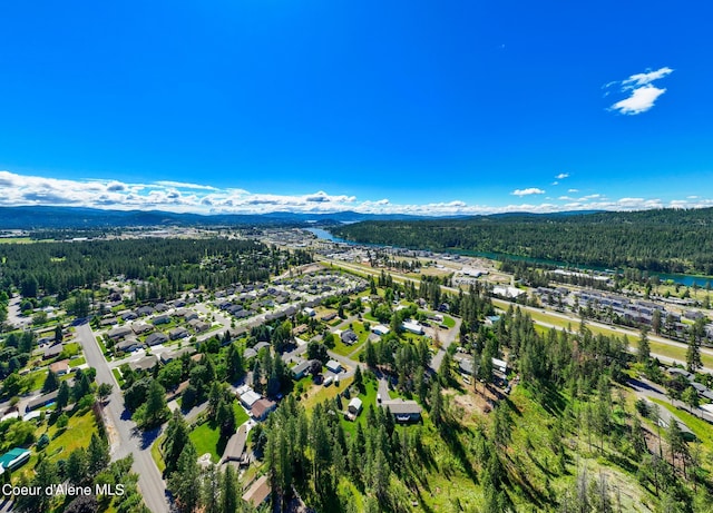 3206 N Lodgepole Rd, Coeur Dalene, ID 83815 - aerial view of a heavily wooded area and a mountainous background