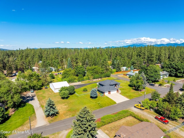 3206 N Lodgepole Rd, Coeur Dalene, ID 83815 - bird's eye view of a heavily wooded area and a mountainous background