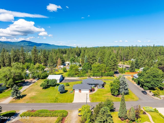 3206 N Lodgepole Rd, Coeur Dalene, ID 83815 - drone / aerial view of a forest and a mountain backdrop