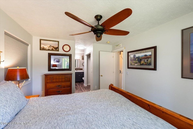 7315 W Lund St, Rathdrum, ID 83858 - bedroom with a textured ceiling, ensuite bath, and ceiling fan