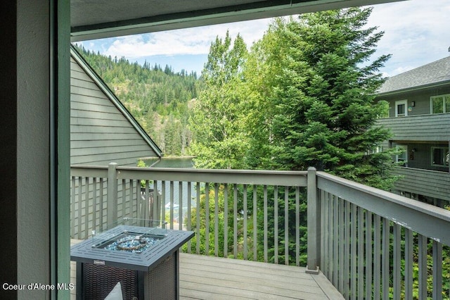 5653 W Racquet Rd, Rathdrum, ID 83858 - deck featuring a view of trees