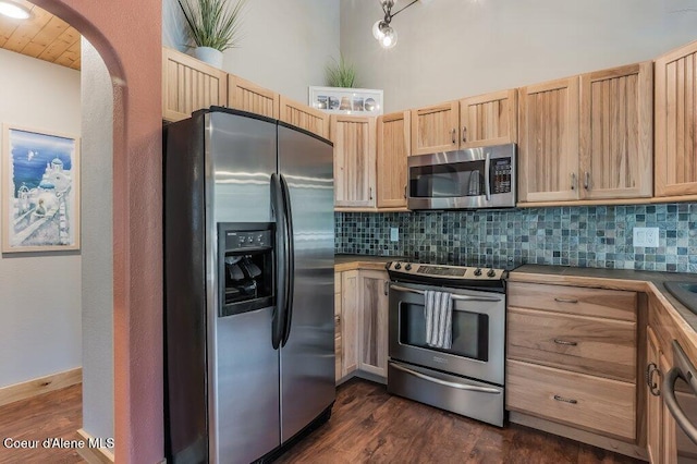 5653 W Racquet Rd, Rathdrum, ID 83858 - kitchen featuring stainless steel appliances, light brown cabinets, backsplash, and dark wood-style floors