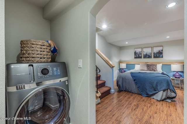 5653 W Racquet Rd, Rathdrum, ID 83858 - laundry area featuring washer / dryer, wood finished floors, and recessed lighting
