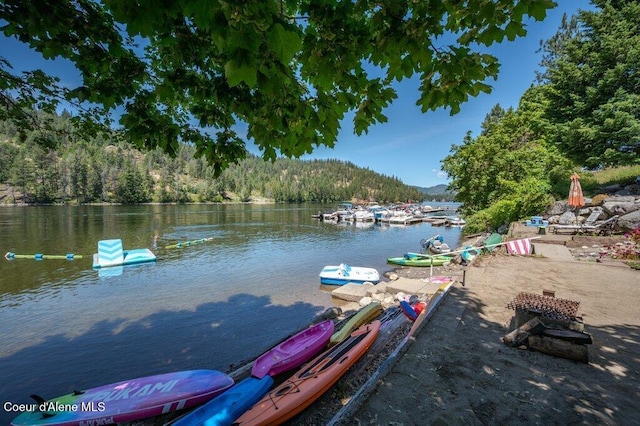 5653 W Racquet Rd, Rathdrum, ID 83858 - dock area with a water view and a forest view