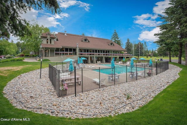 5653 W Racquet Rd, Rathdrum, ID 83858 - community pool with a patio area