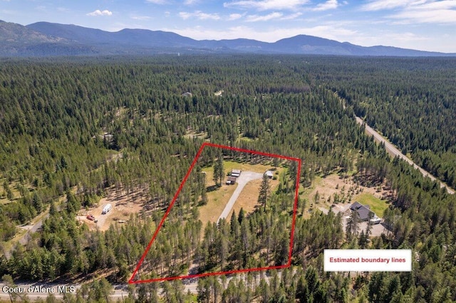 17320 E Perimeter Rd, Athol, ID 83801 - aerial overview of property's location featuring a mountain backdrop and property parcel outlined