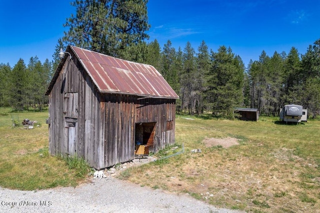 17320 E Perimeter Rd, Athol, ID 83801 - view of shed with a view of trees