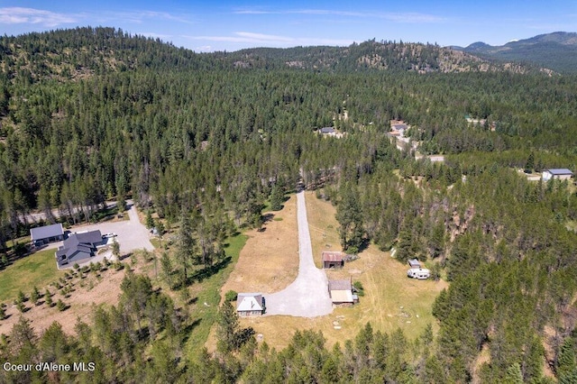 17320 E Perimeter Rd, Athol, ID 83801 - aerial view of property and surrounding area with a forest and a mountain backdrop