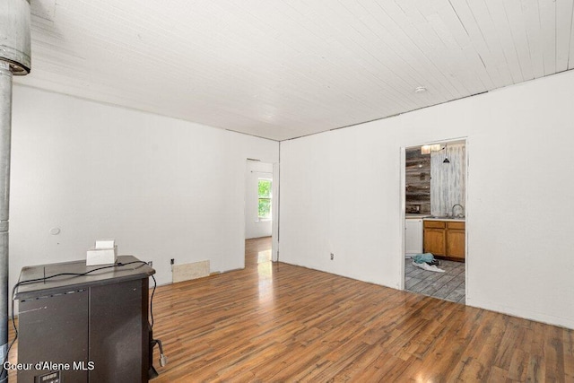 17320 E Perimeter Rd, Athol, ID 83801 - spare room with wood finished floors