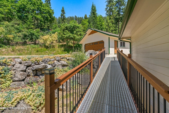 17544 E Arapaho Rd, Bayview, ID 83803 - deck with an outdoor structure and a garage