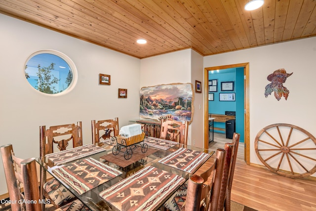 17544 E Arapaho Rd, Bayview, ID 83803 - dining area with wood finished floors, wooden ceiling, recessed lighting, and crown molding