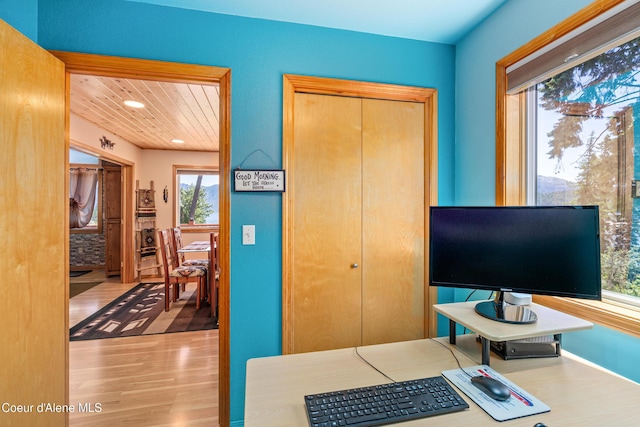 17544 E Arapaho Rd, Bayview, ID 83803 - office featuring healthy amount of natural light, wood finished floors, wood ceiling, and recessed lighting