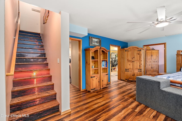 17544 E Arapaho Rd, Bayview, ID 83803 - bedroom featuring wood finished floors and a ceiling fan