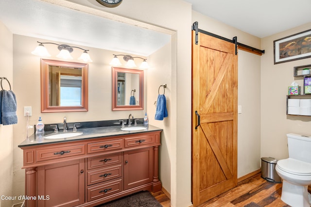 17544 E Arapaho Rd, Bayview, ID 83803 - bathroom featuring wood finished floors and double vanity