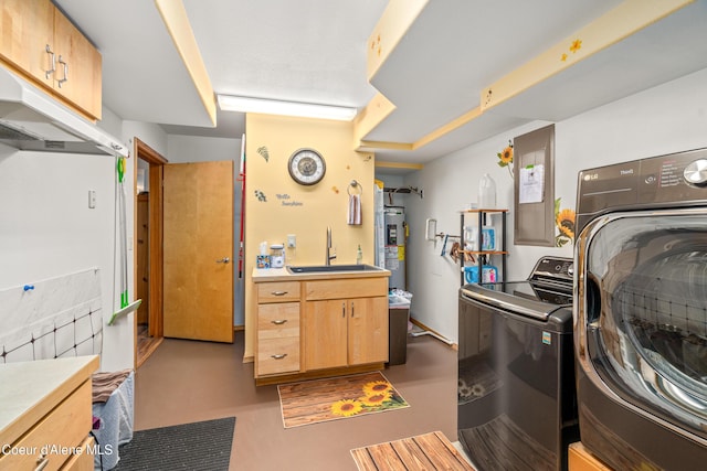17544 E Arapaho Rd, Bayview, ID 83803 - laundry room with cabinet space, water heater, and washer and dryer