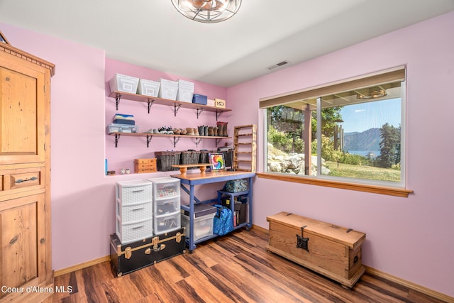 17544 E Arapaho Rd, Bayview, ID 83803 - office area with wood finished floors and baseboards