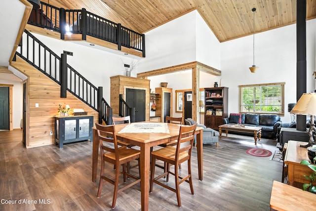 80 Half Cir, Priest River, ID 83856 - dining area with high vaulted ceiling, stairs, wood ceiling, and wood finished floors