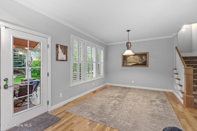 12155 N Yearling Cir, Hayden, ID 83835 - entrance foyer with wood finished floors, ornamental molding, and stairs