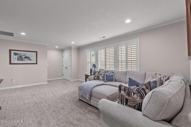 12155 N Yearling Cir, Hayden, ID 83835 - carpeted living room featuring ornamental molding, recessed lighting, and a textured ceiling