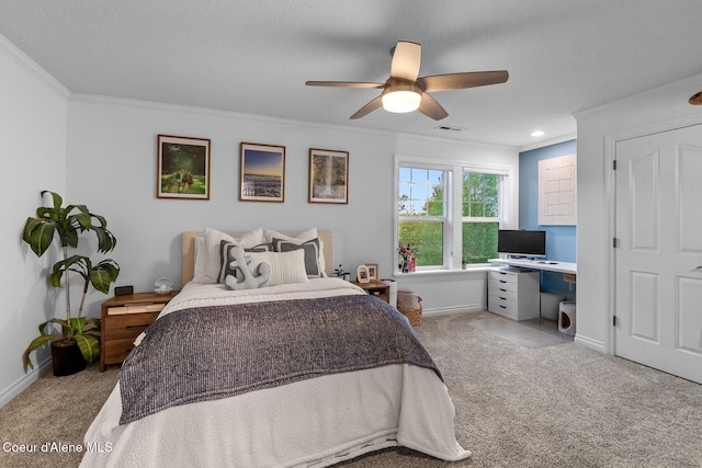 12155 N Yearling Cir, Hayden, ID 83835 - carpeted bedroom with crown molding, an office area, and a ceiling fan