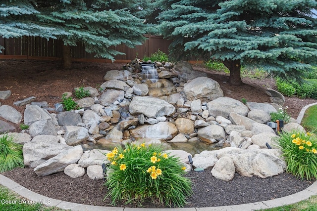12155 N Yearling Cir, Hayden, ID 83835 - view of yard with a small pond
