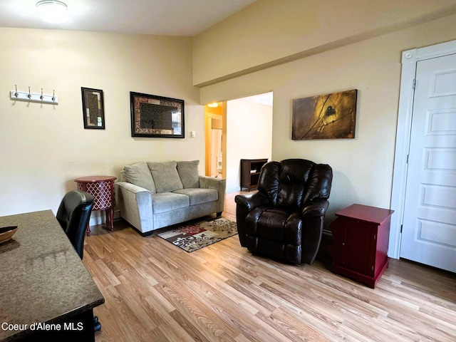 623 E Whispering Pines Ln # 3, Coeur Dalene, ID 83815 - living area with light wood finished floors and vaulted ceiling