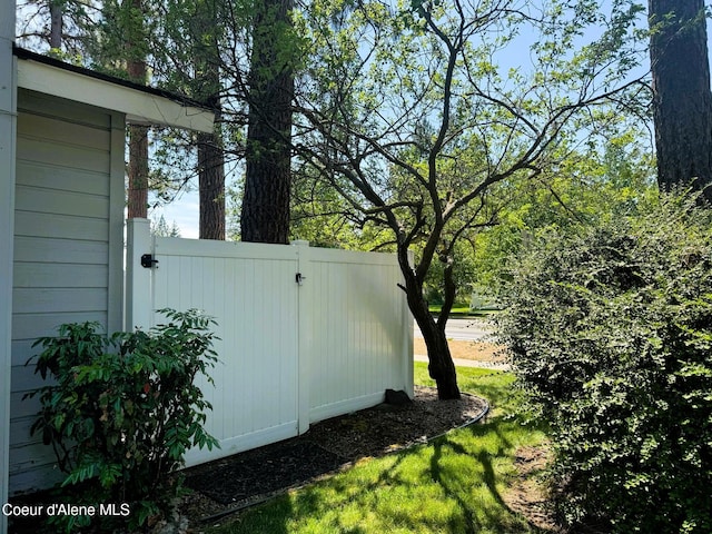 623 E Whispering Pines Ln # 3, Coeur Dalene, ID 83815 - view of yard with a gate