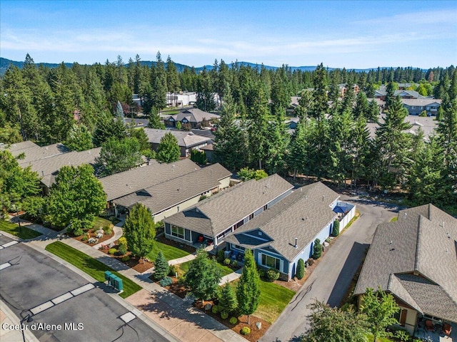 1232 W Grove Way, Coeur Dalene, ID 83815 - aerial view of residential area with mountains and a forest