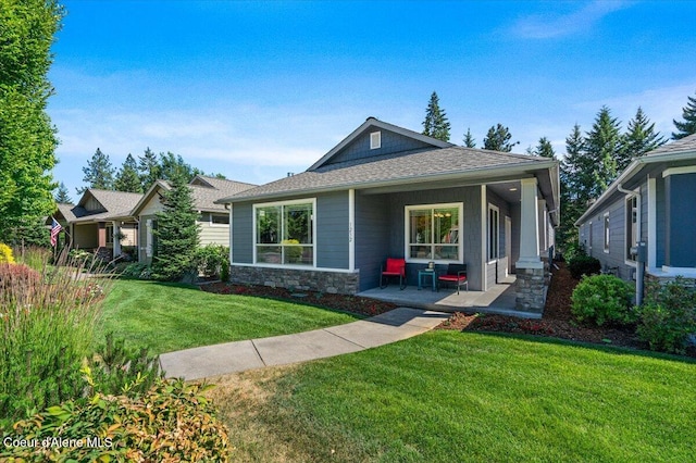 1232 W Grove Way, Coeur Dalene, ID 83815 - view of front of home with stone siding, a front lawn, and a porch