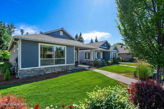 1232 W Grove Way, Coeur Dalene, ID 83815 - view of front of property with stone siding and a front yard
