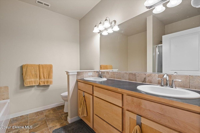 1232 W Grove Way, Coeur Dalene, ID 83815 - bathroom with double vanity, a shower stall, and a garden tub
