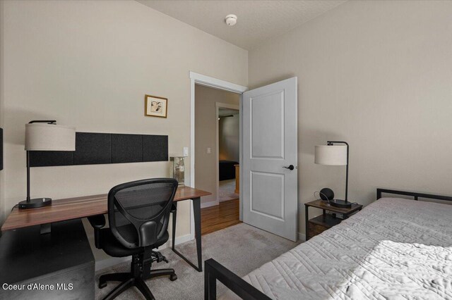 1232 W Grove Way, Coeur Dalene, ID 83815 - bedroom featuring carpet floors and a desk