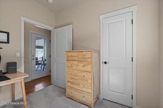 1232 W Grove Way, Coeur Dalene, ID 83815 - bedroom featuring light carpet and a desk