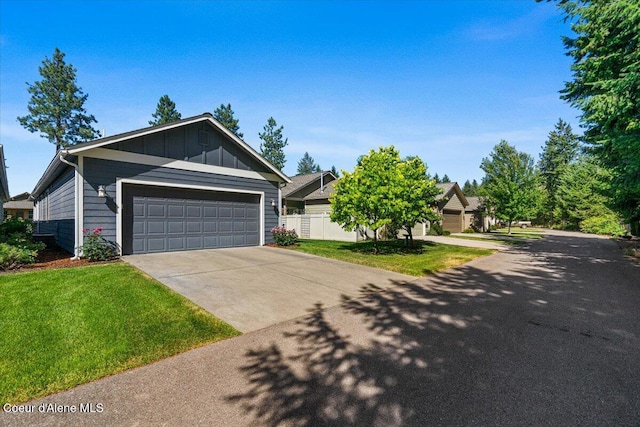 1232 W Grove Way, Coeur Dalene, ID 83815 - view of front facade featuring a garage and board and batten siding