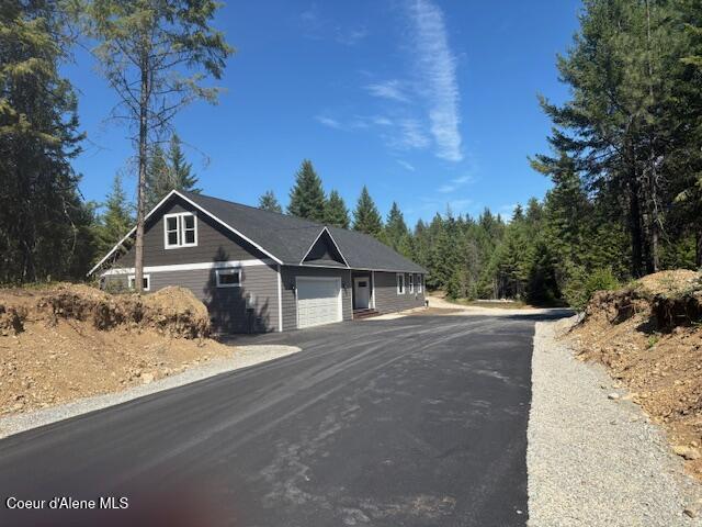 32926 N 10th Ave, Spirit Lake, ID 83869 - view of asphalt driveway