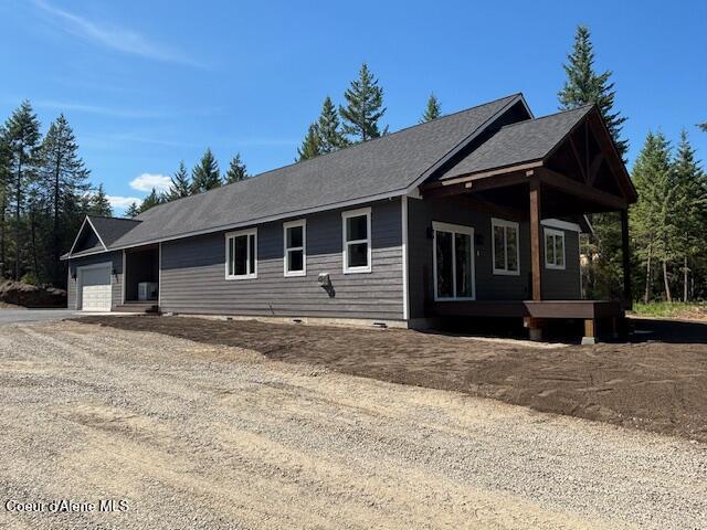 32926 N 10th Ave, Spirit Lake, ID 83869 - ranch-style house featuring an attached garage, driveway, and crawl space