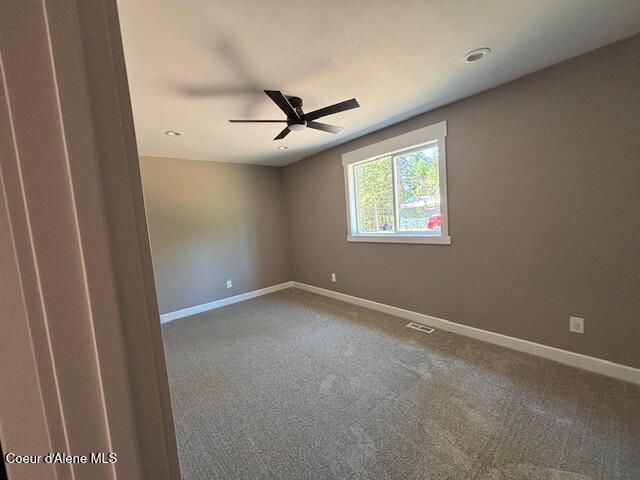 32926 N 10th Ave, Spirit Lake, ID 83869 - carpeted empty room with a ceiling fan and recessed lighting